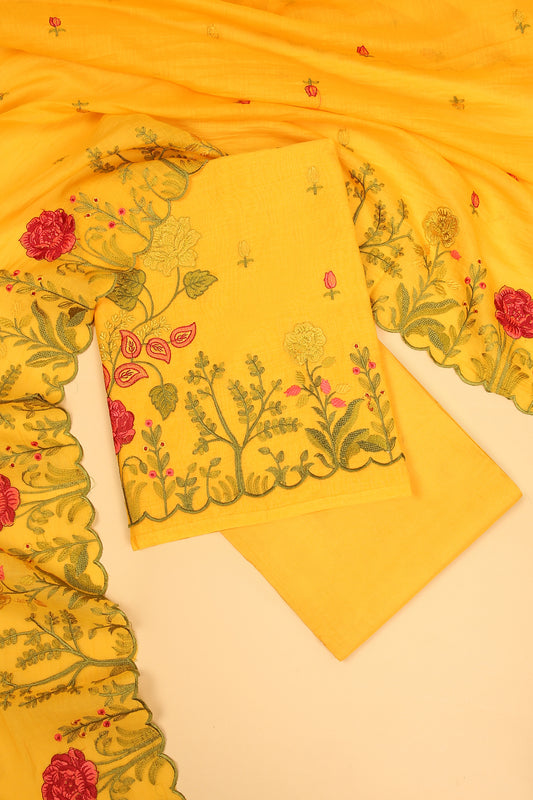 Yellow Mul Chanderi unstitched suit set with multi color embroidery on shirt and dupatta with scallop work