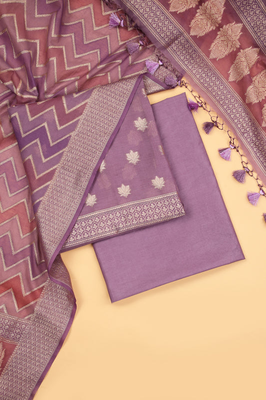Mauve Banarasi Chanderi Silk unstitched suit set in Zari Buti woven shirt paired with Rangkaat and woven dupatta