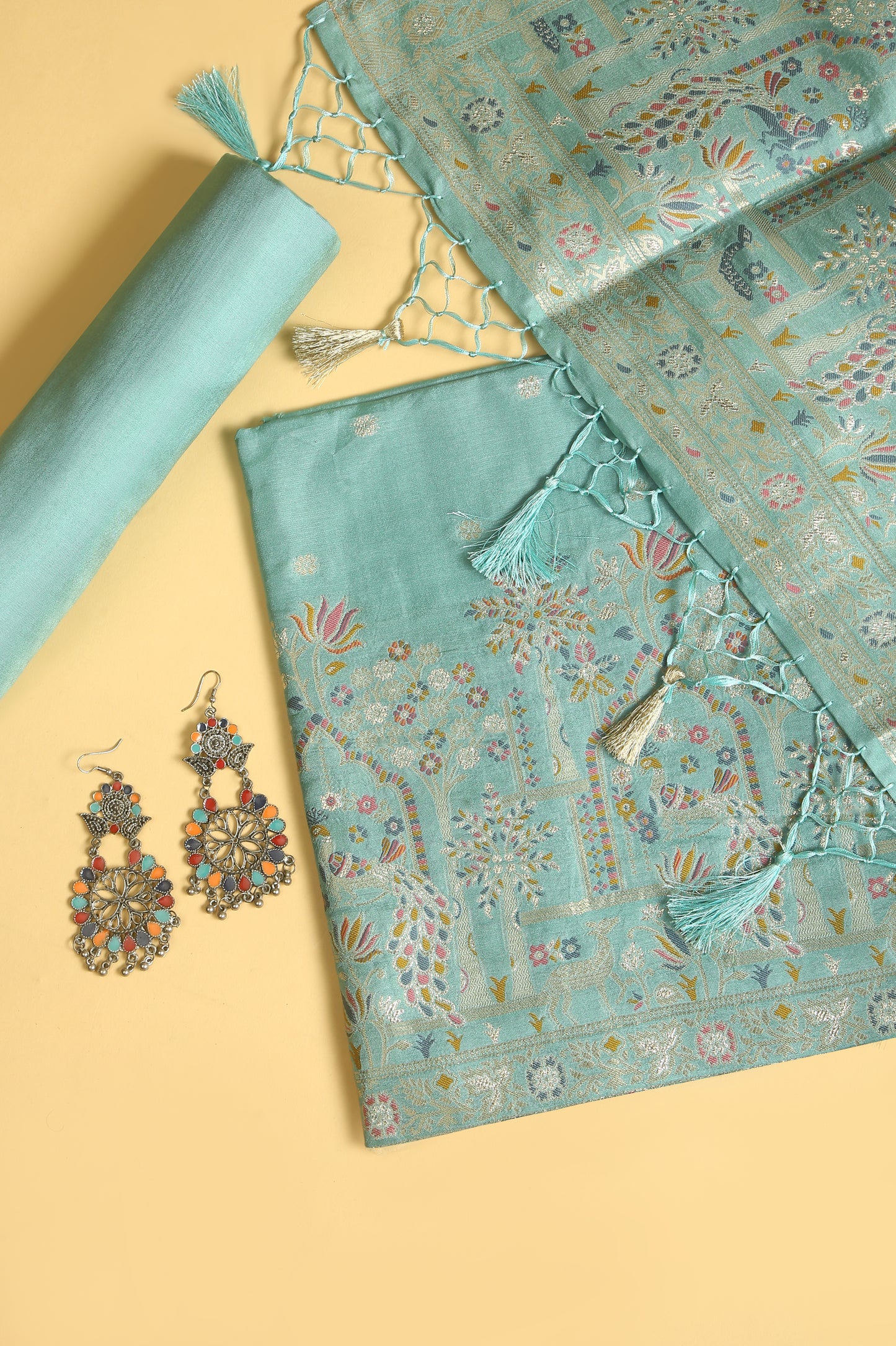 Sea Green Chanderi Silk suit in small motifs all over shirt and dupatta with meenakari work on ghera and border