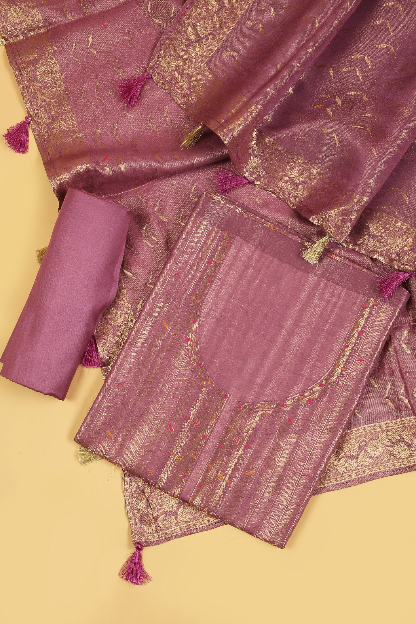 Soft pink Kimkhwab Silk suit set in intricate weaving with light meena detailed work on neckline and body with Gold zari woven dupatta
