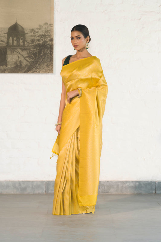 Yellow Soft Silk Saree Woven in Almond Zari within the Fabric giving smooth texture from in and out