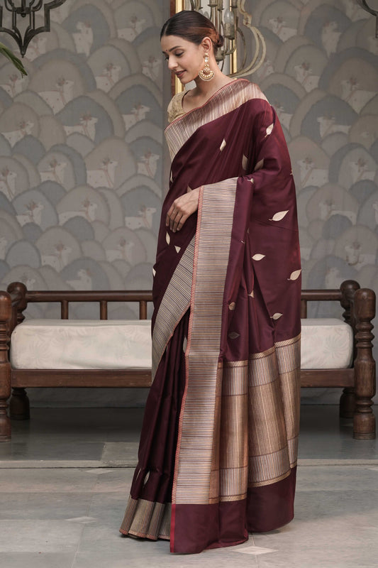 Brown Pure Banarasi Katan Silk Saree with Leaf Swaying motif and vertically stripe designed Marvelous Border Palla