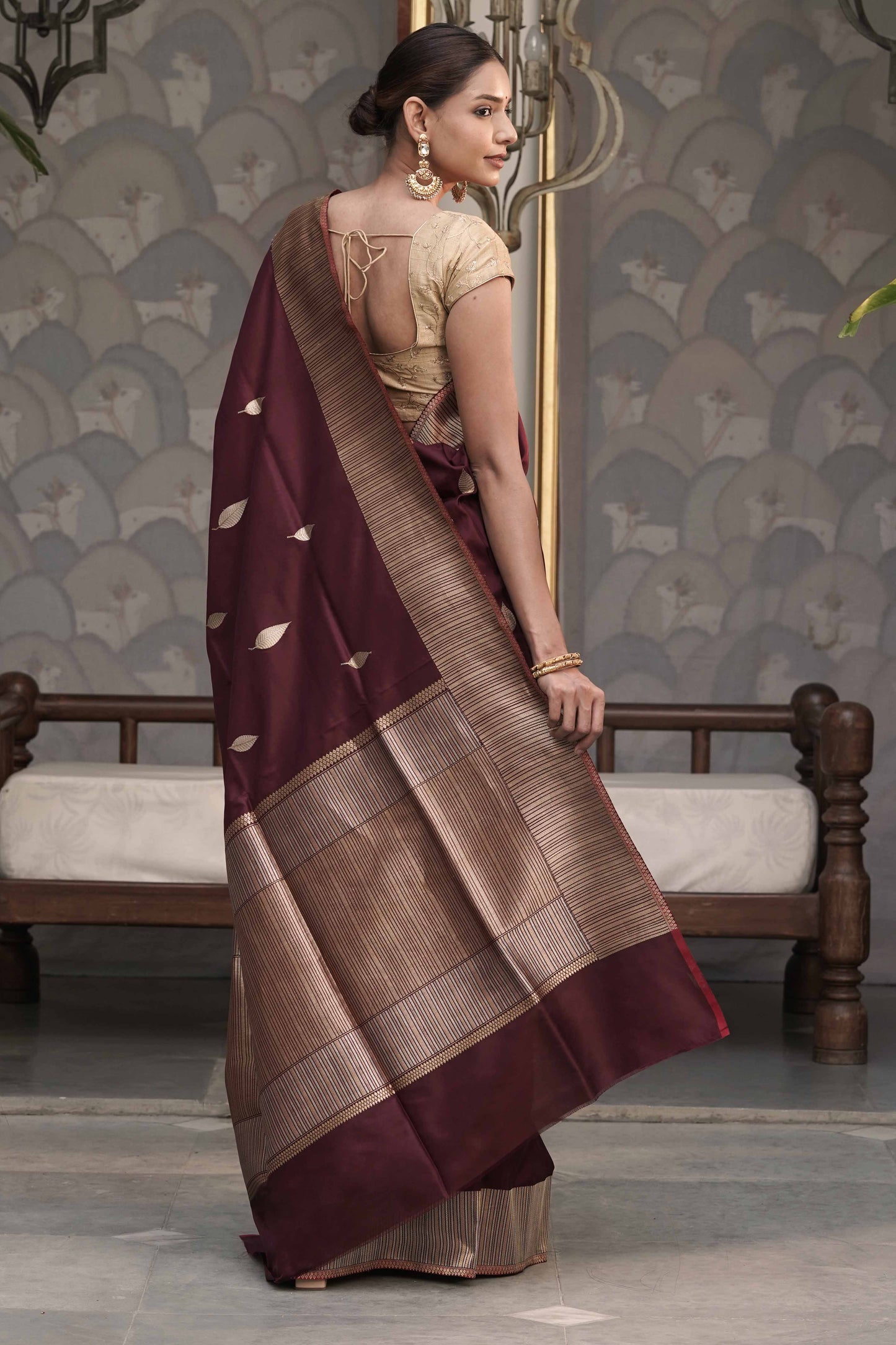 Brown Pure Banarasi Katan Silk Saree with Leaf Swaying motif and vertically stripe designed Marvelous Border Palla