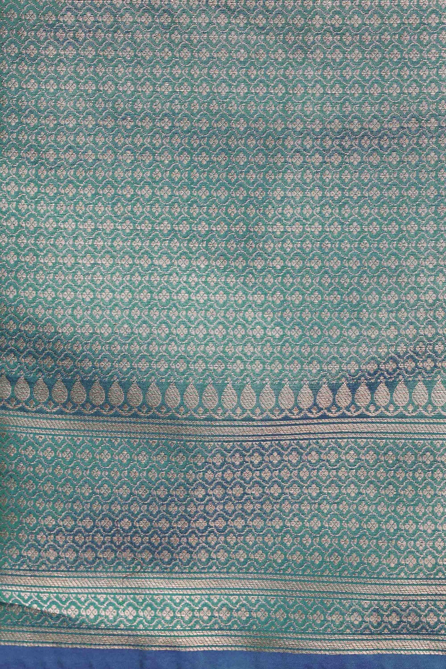 Peacock Dual Tone Plain Blend Silk Saree with traditional border palla and woven blouse