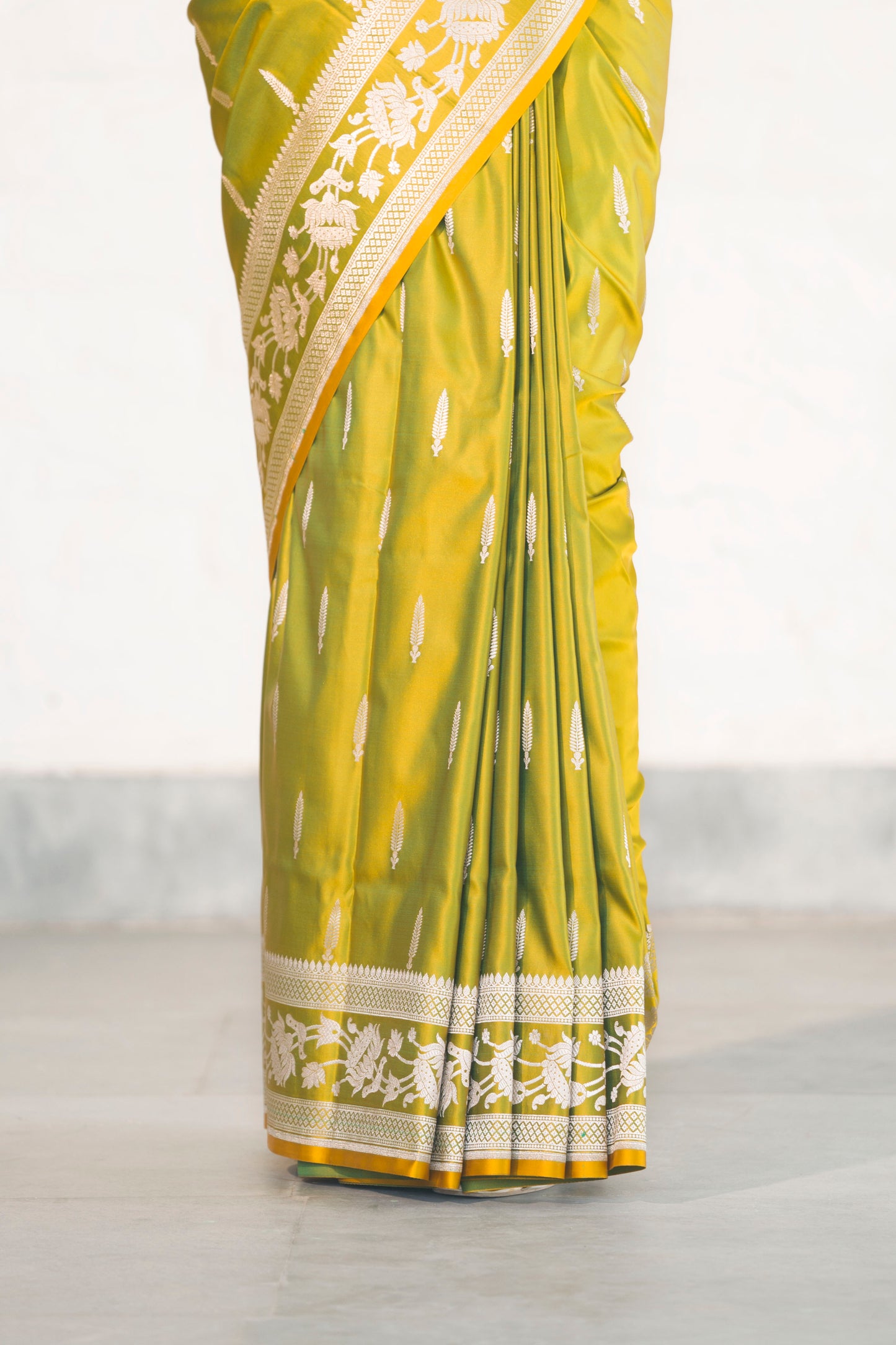 Green Dual Tone Mashru Silk Saree woven in Leaf inspired butis across body paired with Floral bel border