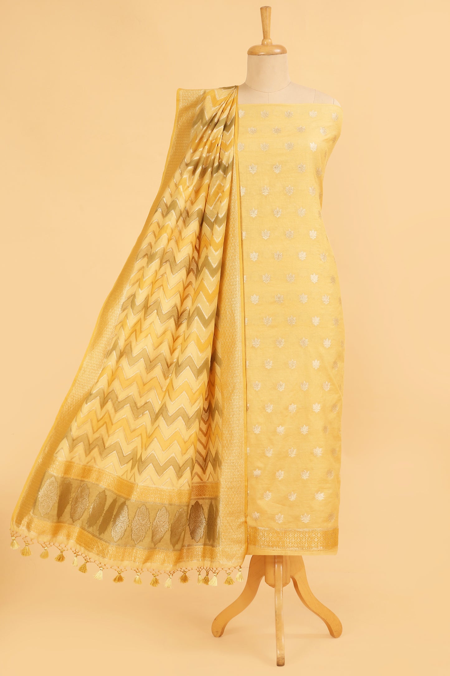 Light Yellow Banarasi Chanderi Silk unstitched suit set in Zari Buti woven shirt paired with Rangkaat and woven dupatta