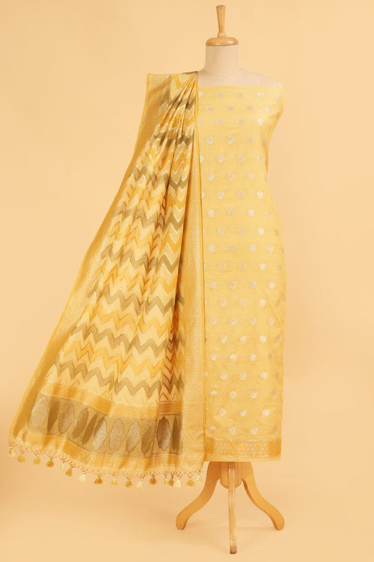 Light Yellow Banarasi Chanderi Silk unstitched suit set in Zari Buti woven shirt paired with Rangkaat and woven dupatta