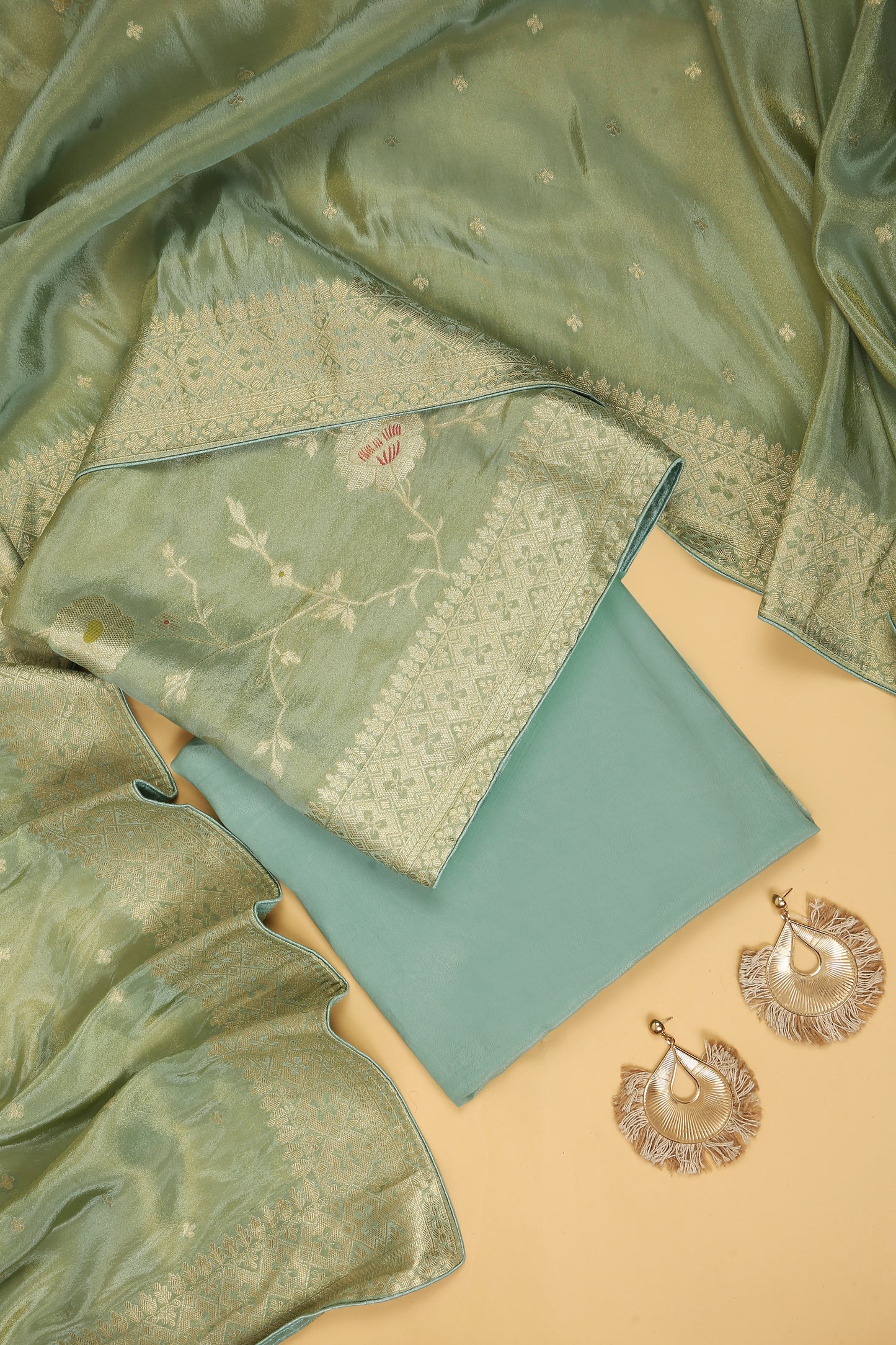 Sea Green Tissue Silk in small buti paired with Floral and Meenakari Zari Weave on Daaman and Dupatta