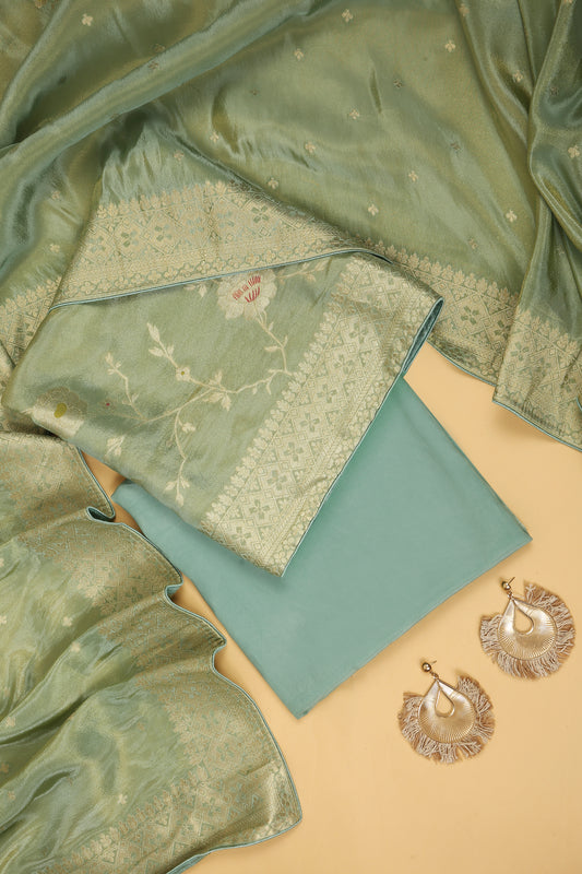 Sea Green Tissue Silk in small buti paired with Floral and Meenakari Zari Weave on Daaman and Dupatta