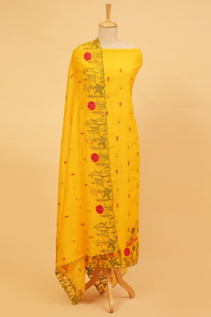 Yellow Mul Chanderi unstitched suit set with multi color embroidery on shirt and dupatta with scallop work
