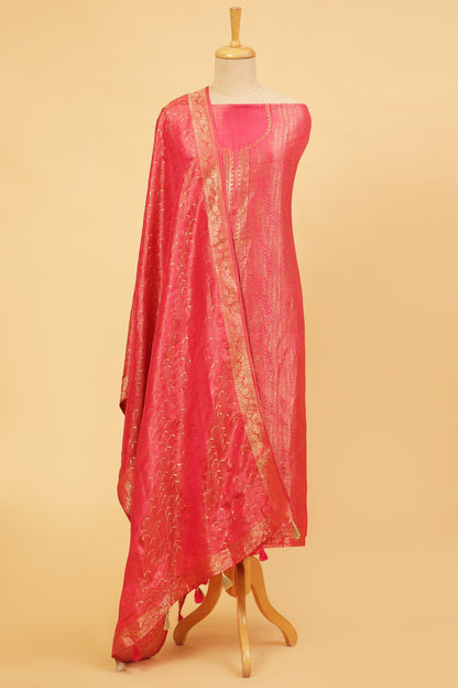 Pink Kimkhwab Silk suit set in intricate weaving with light meena detailed work on neckline and body with Gold zari woven dupatta