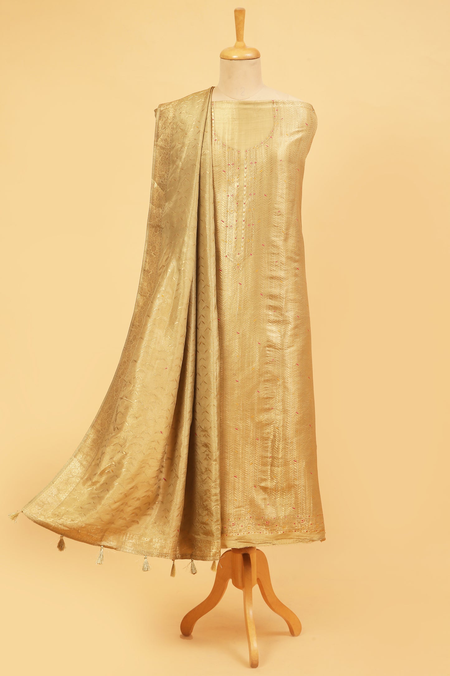 Golden Kimkhwab Silk suit set in intricate weaving with light meena detailed work on neckline and body with Gold zari woven dupatta