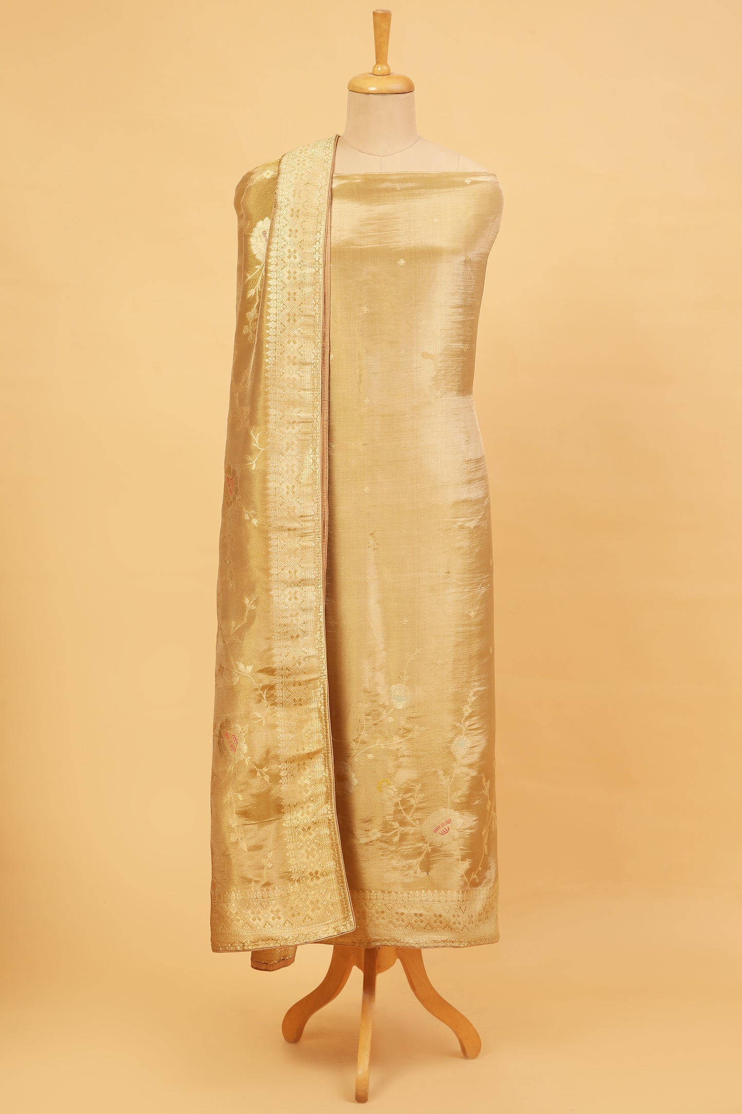Golden Shimmer Tissue Silk in small buti paired with Floral and Meenakari Zari Weave on Daaman and Dupatta