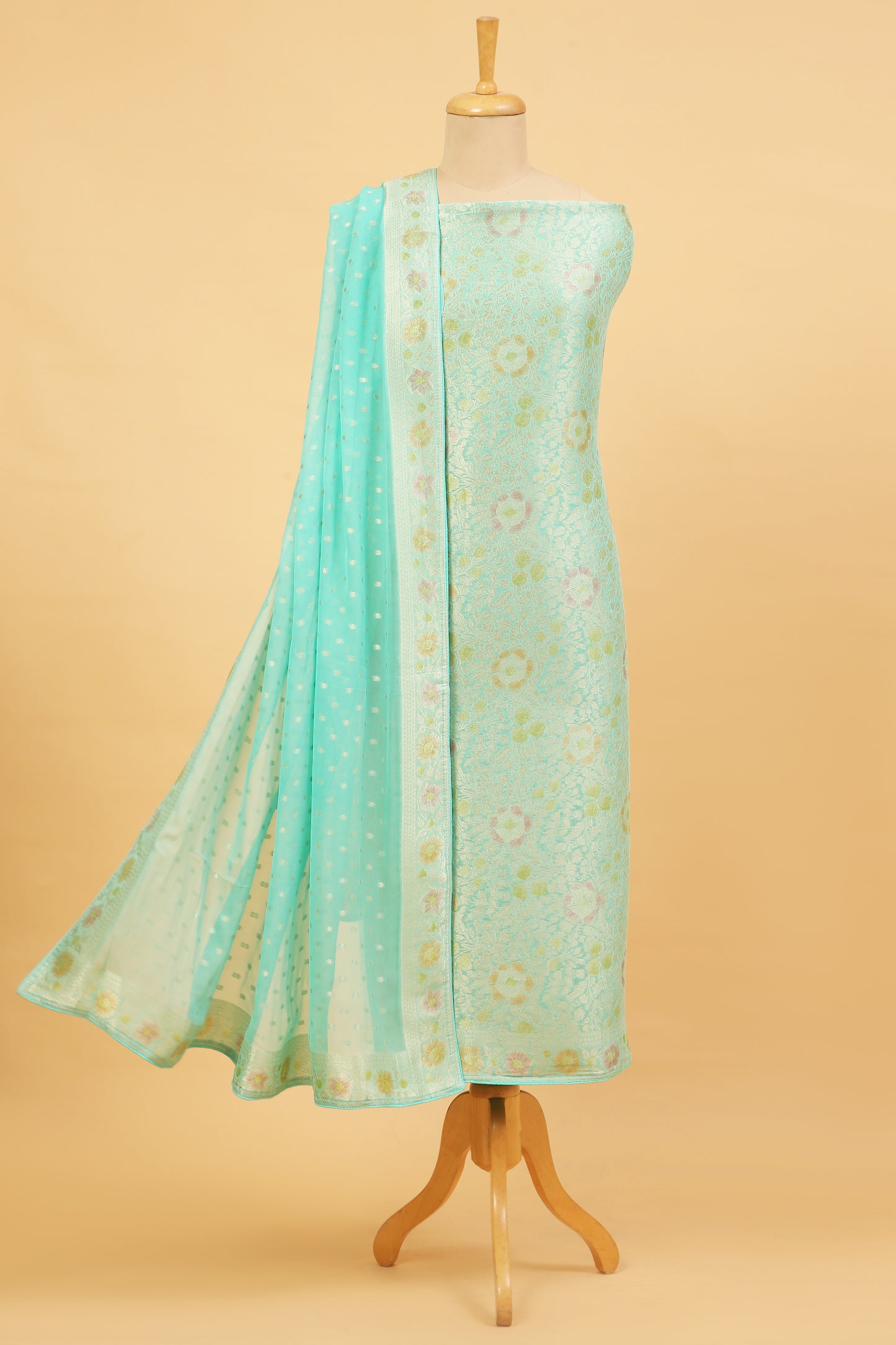 Turquoise Khaddi Georgette Silk Suit in Floral Jaal pattern on shirt and Rangkaat on shirt and dupatta with plain crepe silk bottom