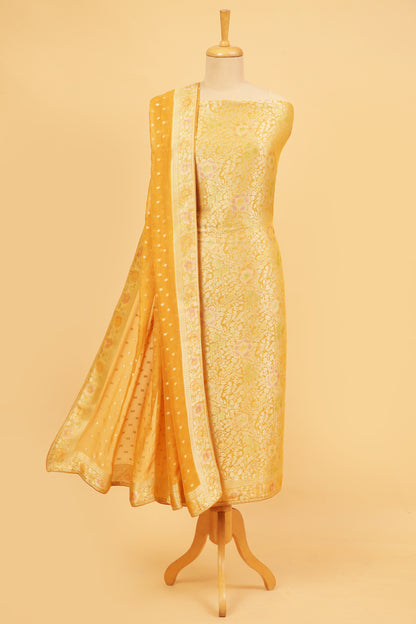 Mustard Yellow Khaddi Georgette Silk Suit in Floral Jaal pattern on shirt and Rangkaat on shirt and dupatta with plain crepe silk bottom
