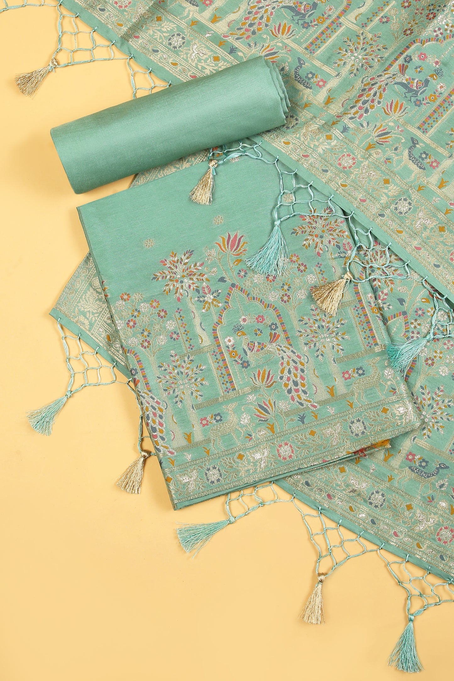Sea Green Chanderi Silk suit in small motifs all over shirt and dupatta with meenakari work on ghera and border