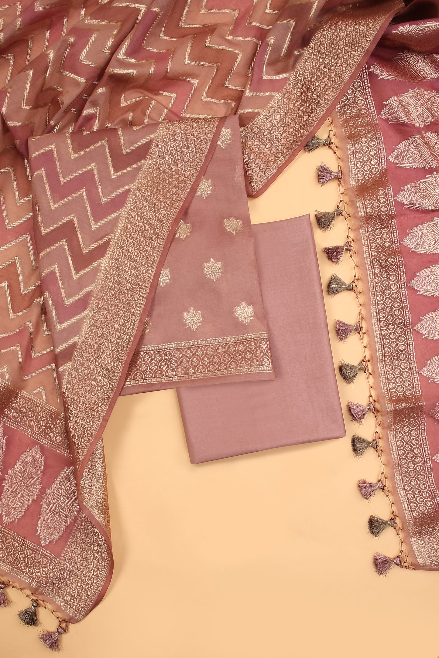 Blush Nude Banarasi Chanderi Silk unstitched suit set in Zari Buti woven shirt paired with Rangkaat and woven dupatta