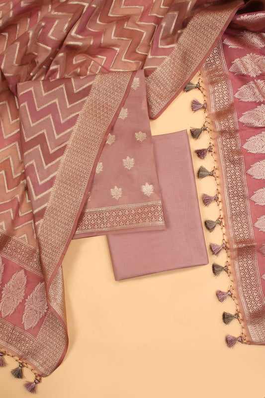 Blush Nude Banarasi Chanderi Silk unstitched suit set in Zari Buti woven shirt paired with Rangkaat and woven dupatta