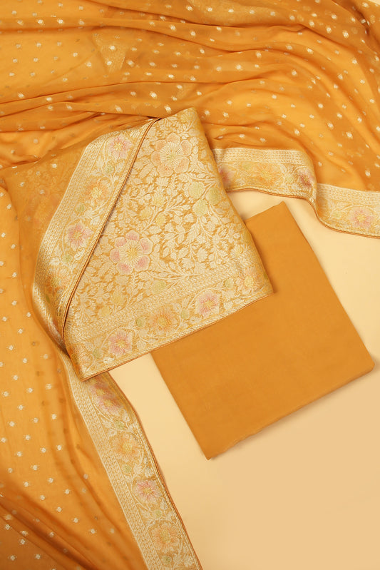 Mustard Yellow Khaddi Georgette Silk Suit in Floral Jaal pattern on shirt and Rangkaat on shirt and dupatta with plain crepe silk bottom