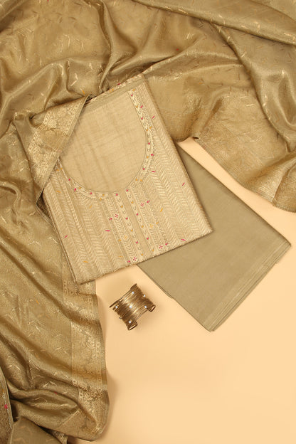 Golden Kimkhwab Silk suit set in intricate weaving with light meena detailed work on neckline and body with Gold zari woven dupatta