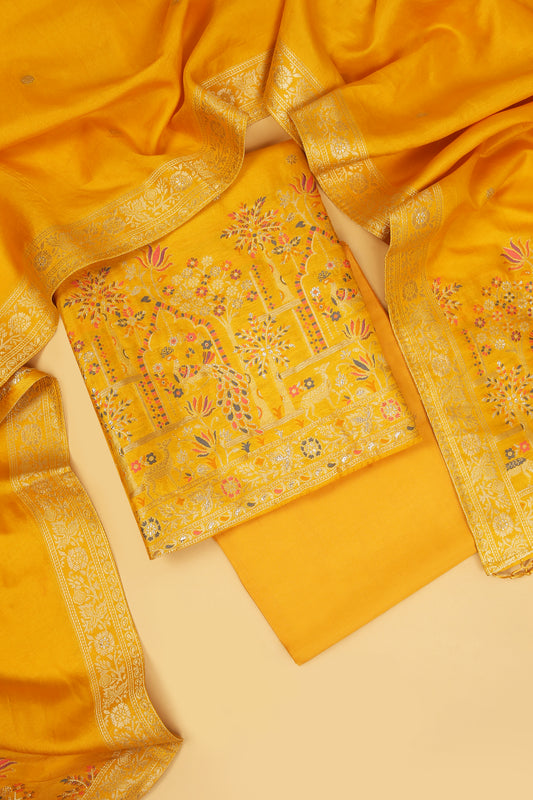 Yellow Chanderi Silk suit in small motifs all over shirt and dupatta with meenakari work on ghera and border