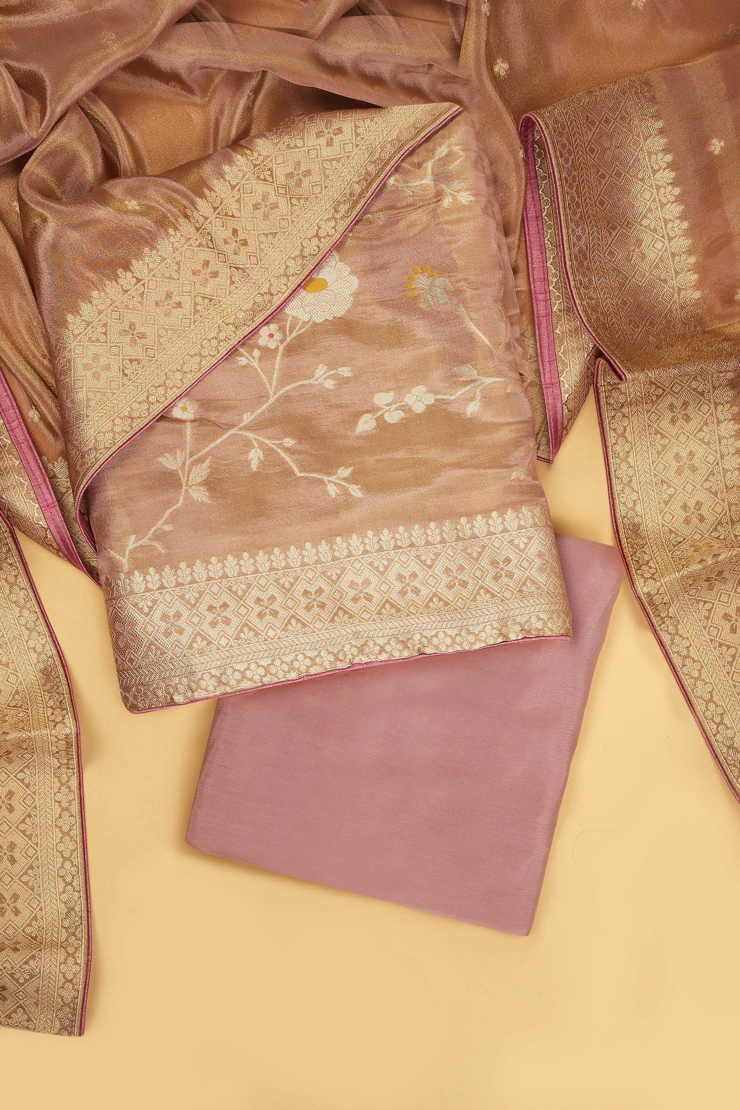 Soft Pink Tissue Silk in small buti paired with Floral and Meenakari Zari Weave on Daaman and Dupatta