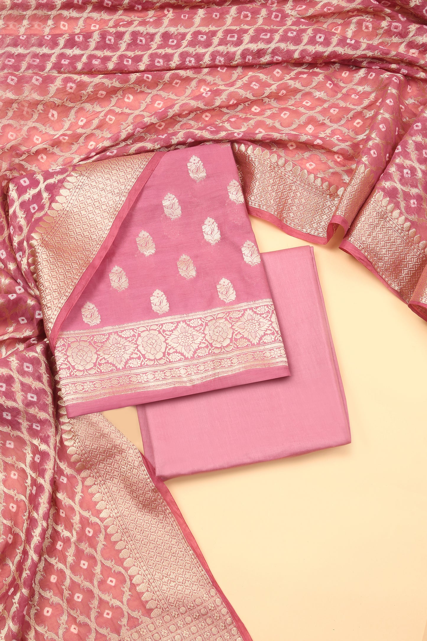 Light Pink Banarasi Chanderi Silk unstitched suit set in Zari Buti woven shirt with Bandhani and woven dupatta
