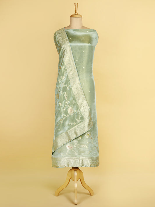 Sea Green Tissue Silk in small buti paired with Floral and Meenakari Zari Weave on Daaman and Dupatta