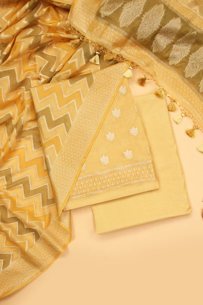 Light Yellow Banarasi Chanderi Silk unstitched suit set in Zari Buti woven shirt paired with Rangkaat and woven dupatta