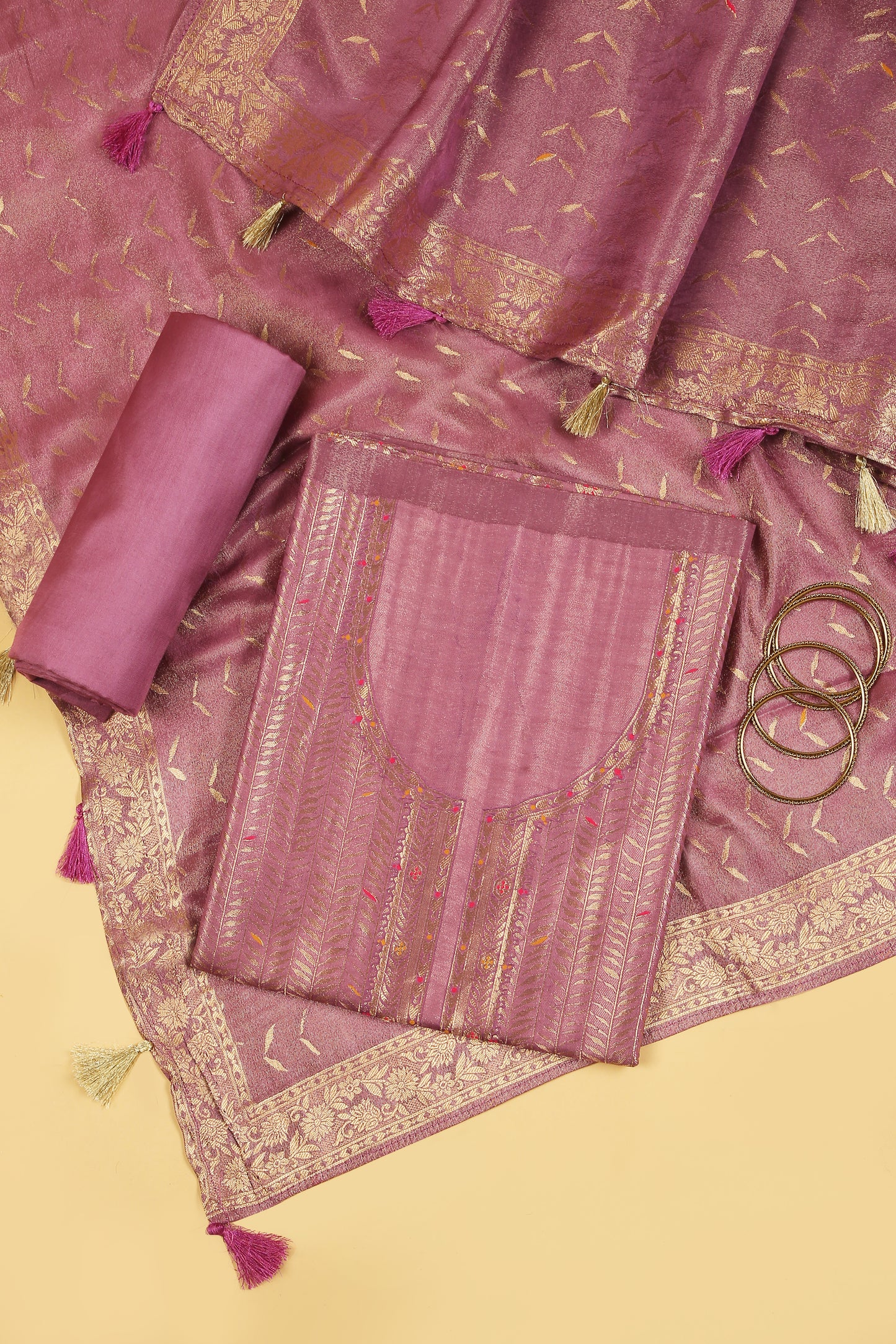Soft pink Kimkhwab Silk suit set in intricate weaving with light meena detailed work on neckline and body with Gold zari woven dupatta