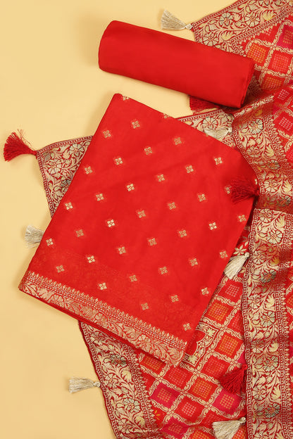 Rust orange Khaddi Georgette Silk Suit in small buti on shirt and Bandhani Weave dupatta with plain crepe silk bottom