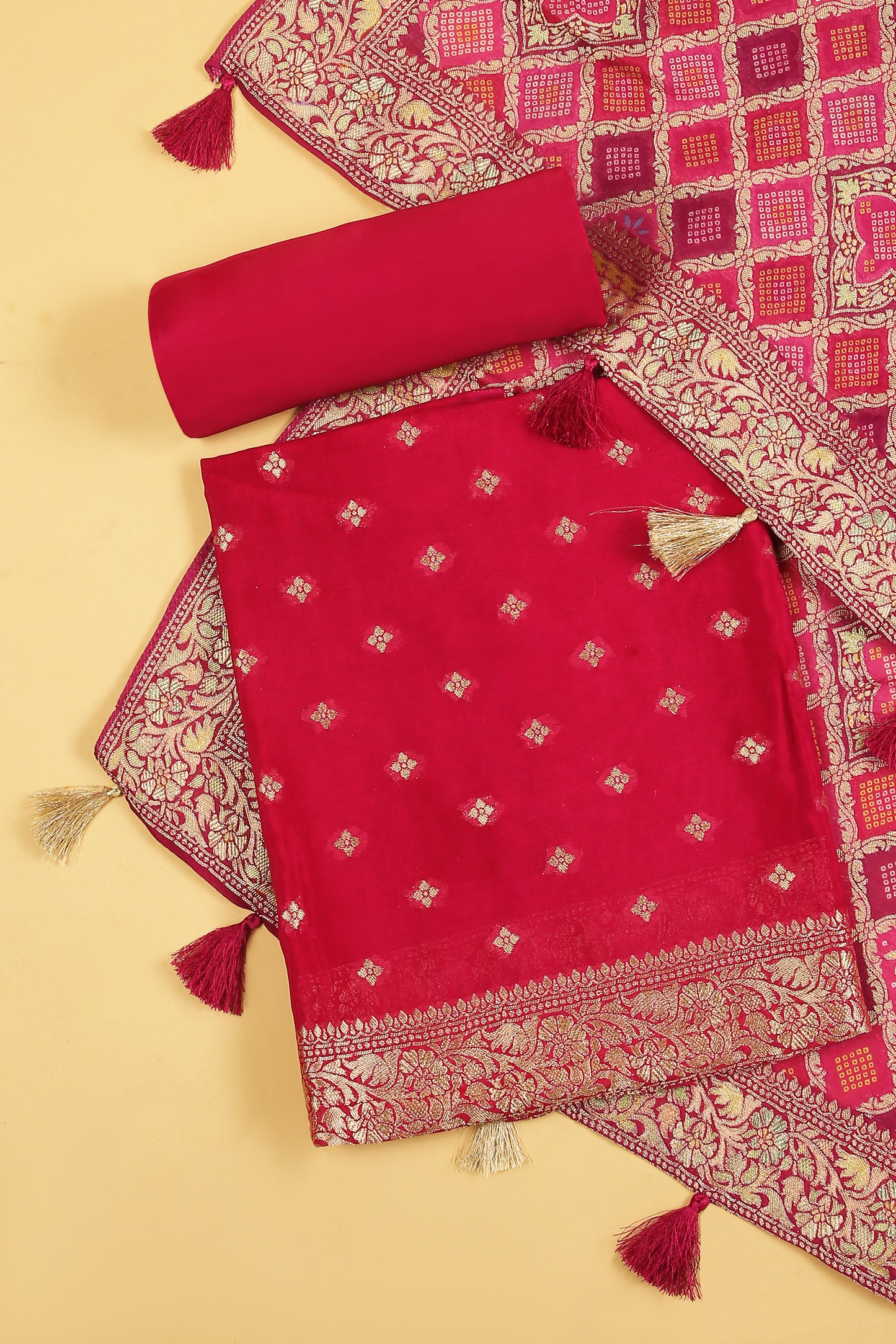 Rani Pink Khaddi Georgette Silk Suit in small buti on shirt and Bandhani Weave dupatta with plain crepe silk bottom