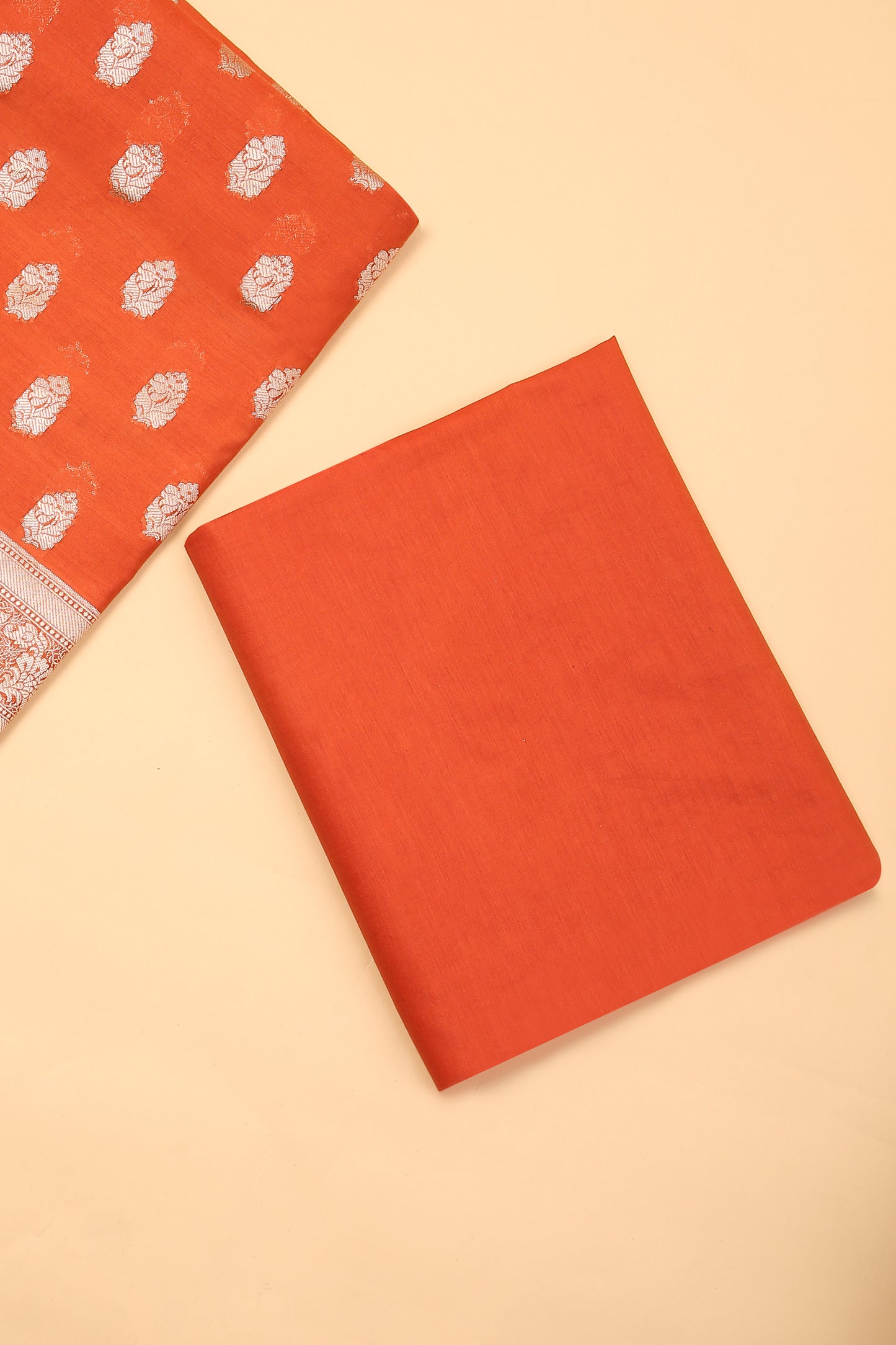 Orange Banarasi Chanderi Silk unstitched suit set in Zari Buti woven shirt with Bandhani and woven dupatta