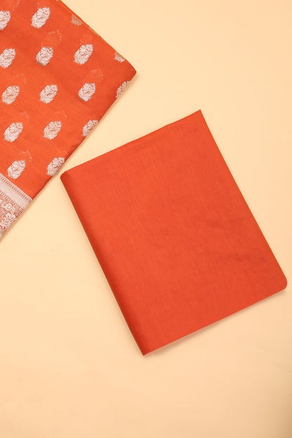 Orange Banarasi Chanderi Silk unstitched suit set in Zari Buti woven shirt with Bandhani and woven dupatta