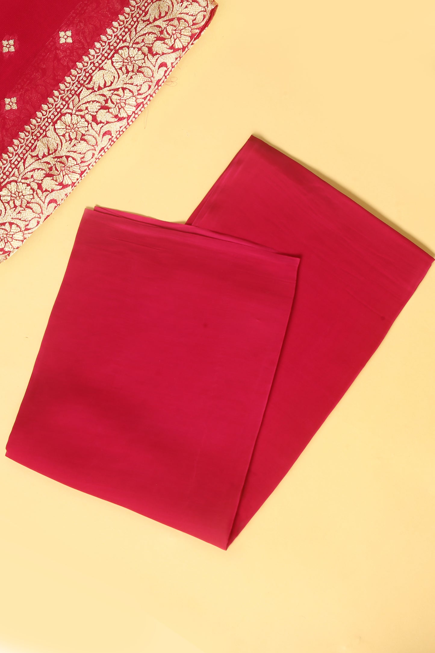 Rani Pink Khaddi Georgette Silk Suit in small buti on shirt and Bandhani Weave dupatta with plain crepe silk bottom