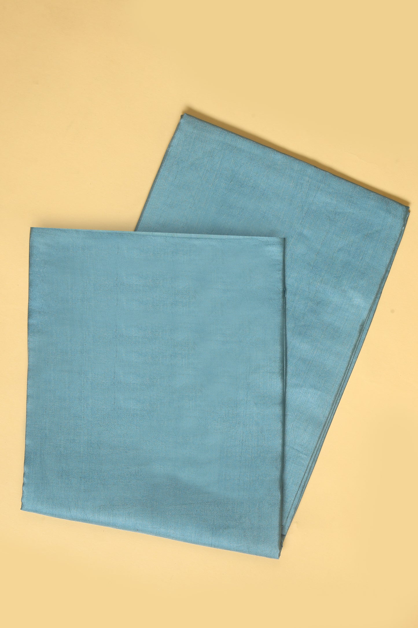 Blue Chanderi Silk suit in Neck Design and tradtional motifs on body woven with golden zari and Ombre motif weaved Dupatta giving subtle contrast with shirt