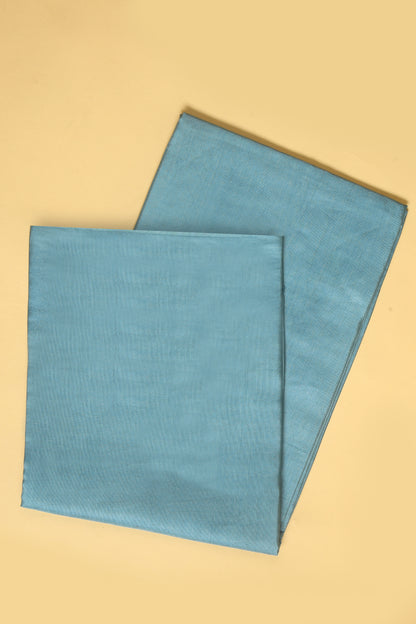 Blue Chanderi Silk suit in Neck Design and tradtional motifs on body woven with golden zari and Ombre motif weaved Dupatta giving subtle contrast with shirt