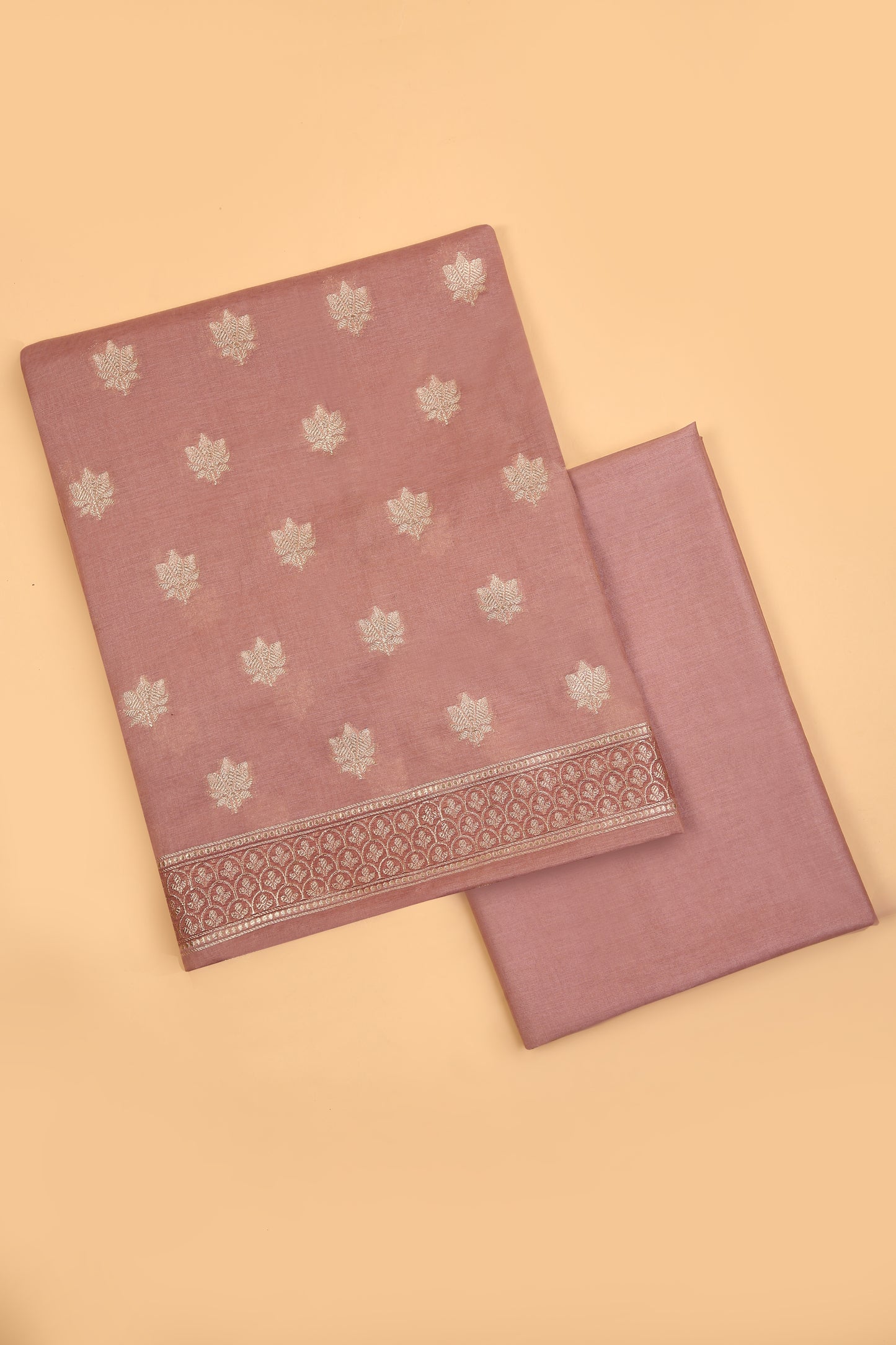Blush Nude Banarasi Chanderi Silk unstitched suit set in Zari Buti woven shirt paired with Rangkaat and woven dupatta