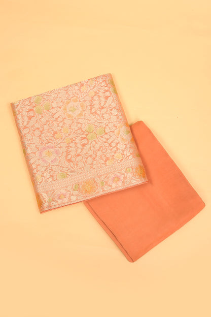 Peach Khaddi Georgette Silk Suit in Floral Jaal pattern on shirt and Rangkaat on shirt and dupatta with plain crepe silk bottom