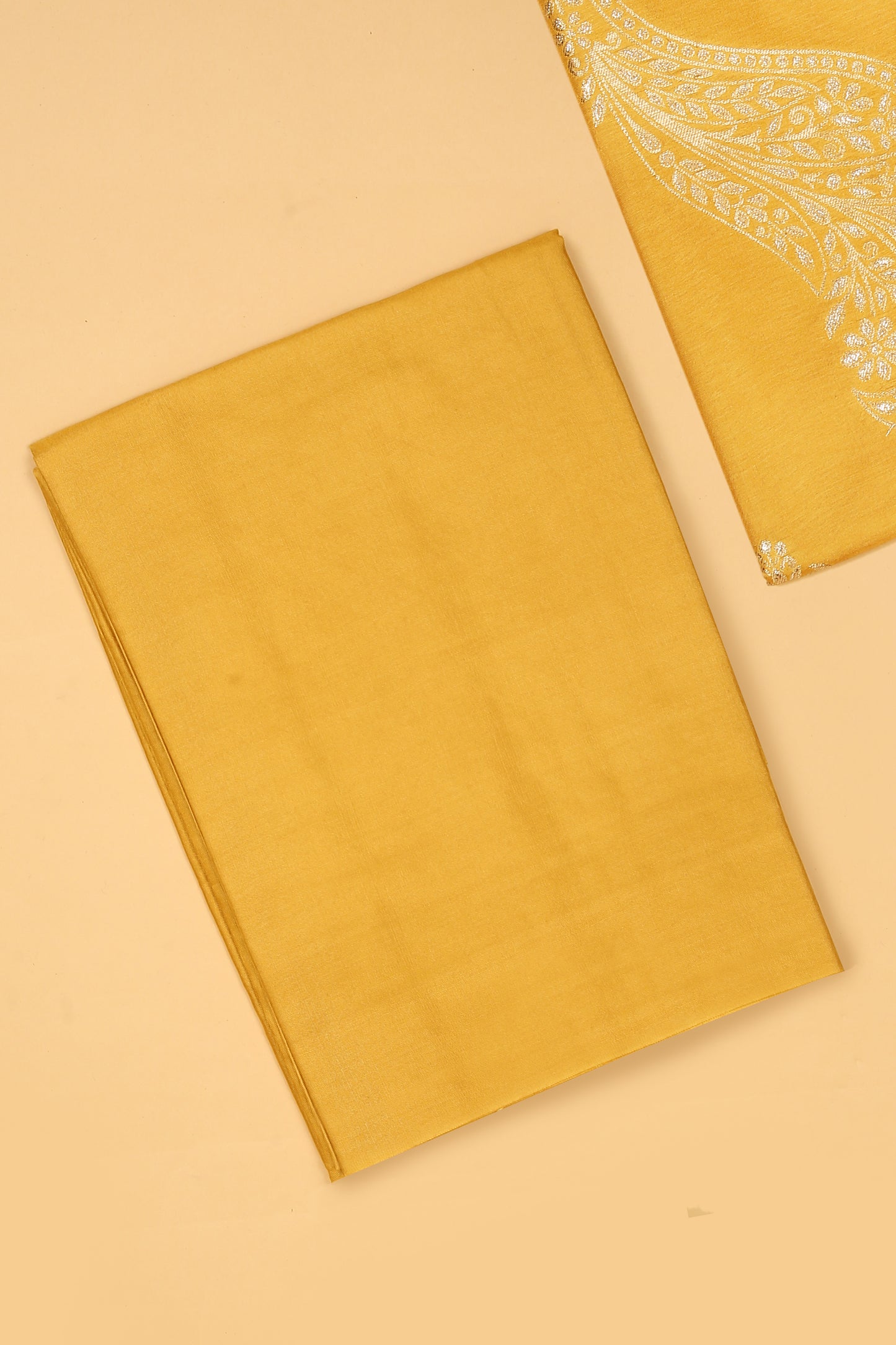 Yellow Chanderi Silk suit in Neck Design and tradtional motifs on body woven with golden zari and Ombre motif weaved Dupatta giving subtle contrast with shirt