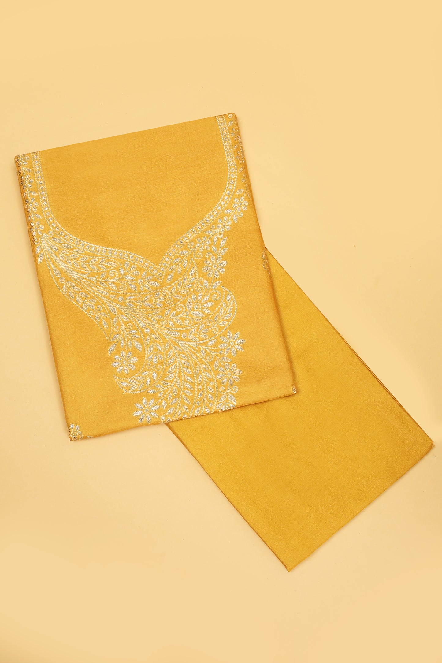 Yellow Chanderi Silk suit in Neck Design and tradtional motifs on body woven with golden zari and Ombre motif weaved Dupatta giving subtle contrast with shirt