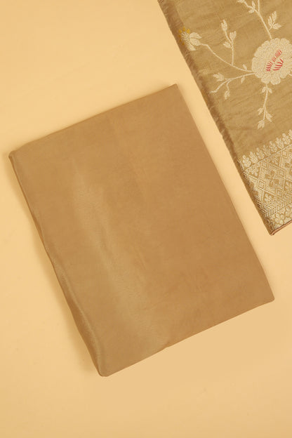 Golden Shimmer Tissue Silk in small buti paired with Floral and Meenakari Zari Weave on Daaman and Dupatta