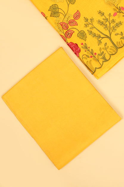 Yellow Mul Chanderi unstitched suit set with multi color embroidery on shirt and dupatta with scallop work