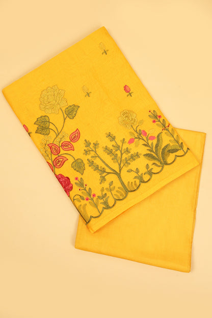 Yellow Mul Chanderi unstitched suit set with multi color embroidery on shirt and dupatta with scallop work