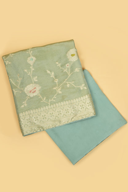Sea Green Tissue Silk in small buti paired with Floral and Meenakari Zari Weave on Daaman and Dupatta