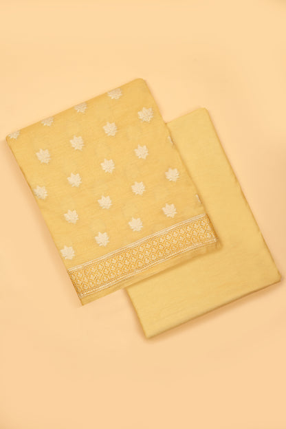 Light Yellow Banarasi Chanderi Silk unstitched suit set in Zari Buti woven shirt paired with Rangkaat and woven dupatta
