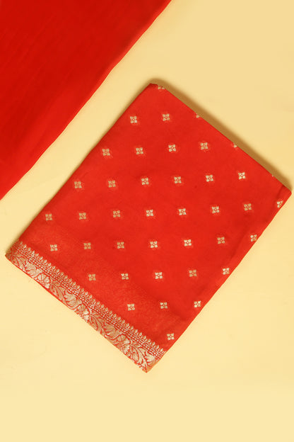 Rust orange Khaddi Georgette Silk Suit in small buti on shirt and Bandhani Weave dupatta with plain crepe silk bottom