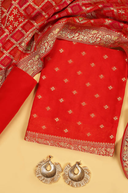 Rust orange Khaddi Georgette Silk Suit in small buti on shirt and Bandhani Weave dupatta with plain crepe silk bottom
