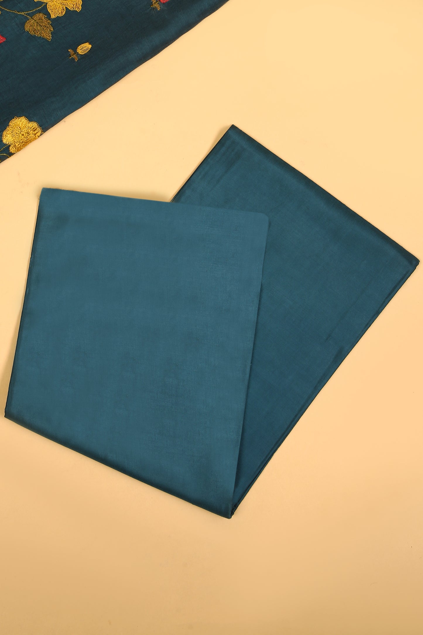 Teal Blue Mul Chanderi unstitched suit set with multi color embroidery on shirt and dupatta with scallop work