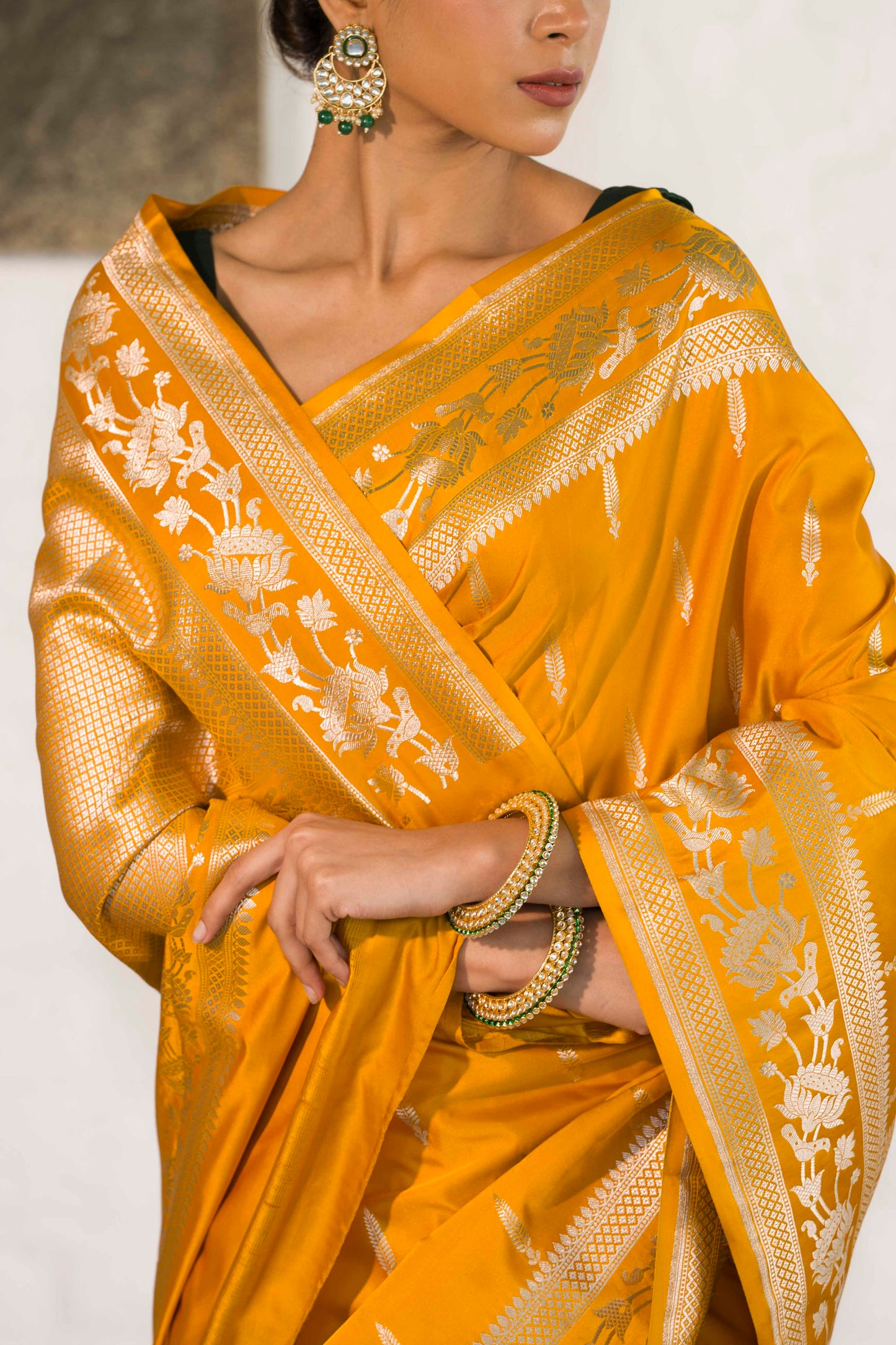 Yellow Mashru Silk Saree woven in Leaf inspired butis across body paired with Floral bel border